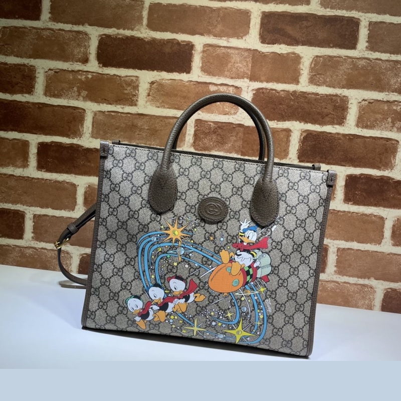 G*u*i shopping bags